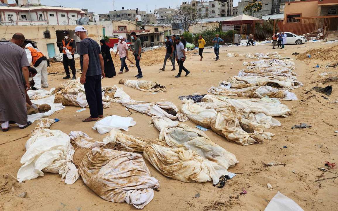 The bodies of Palestinians exhumed from mass graves at the Nasser Hospital complex following the withdrawal of Israeli forces from the city of Khan Yunis in southern Gaza.