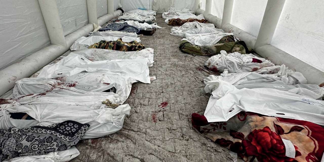 The bodies of Palestinian civilians killed in an Israeli army airstrike.