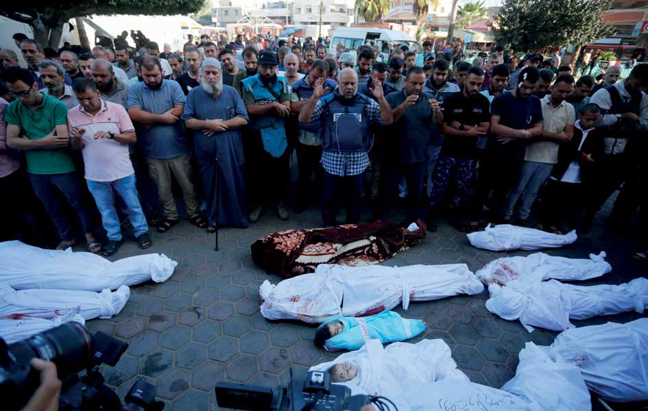 In an attack by the Israeli military targeting a house in the Nuseirat Refugee Camp in the Gaza Strip, many members of the family of Al-Jazeera television correspondent Wail al-Dahduh (left 6) lost their lives, including his wife, son, and daughter. A funeral ceremony for the deceased was held in the city of Deir al-Balah in the central part of Gaza.