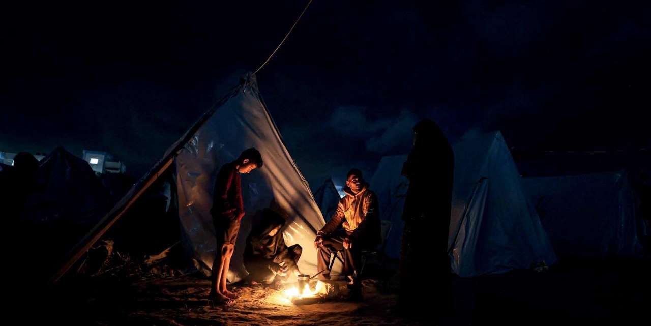 On the fourth day of the humanitarian ceasefire, homeless Palestinians living in tents have lit fires to stay warm. They are grappling with cold weather, extremely limited resources, and challenging conditions as well.