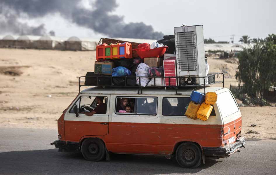 After the Israeli army targeted tents in the Al-Mawasi area of Rafah, which had been designated as 'safe,' Palestinians who had previously been forcibly displaced to this area began to flee again, carrying whatever belongings they could to seek safety elsewhere.