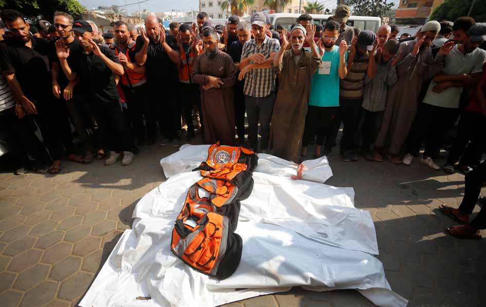 The Israeli army launched an attack on the civil defense headquarters located in the Nuseirat Refugee Camp in central Gaza. The assault resulted in the deaths of three civil defense personnel and left 12 others injured. Funeral prayers for those killed in the attack were held at the Al-Aqsa Martyrs Hospital in Deir al-Balah.