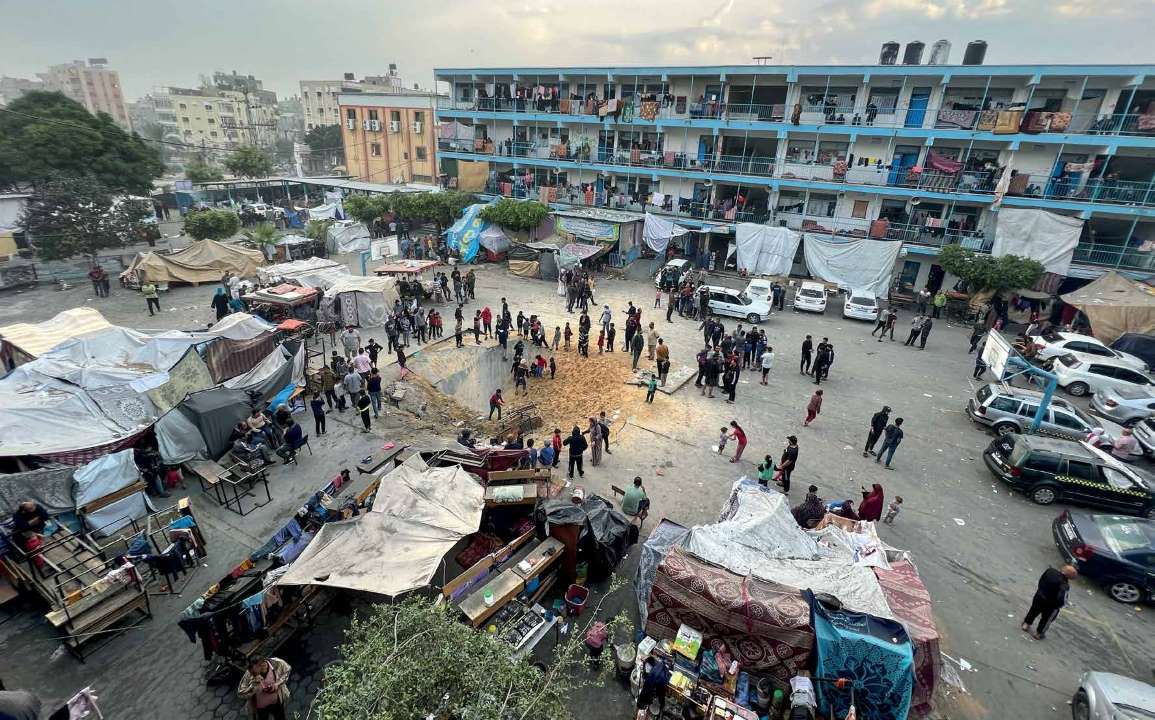 Following the Israeli army’s air strikes on the Jabalia Refugee Camp in Gaza on November 12, 2023, a crater formed.